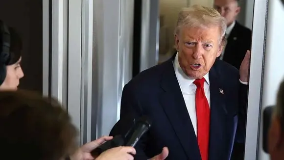 Trump Speaks With Reporters Aboard Air Force One